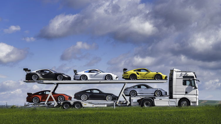 Immagine di Collezione da sogno, sei Porsche GT3 e una bisarca per trasportarle in un unico lotto