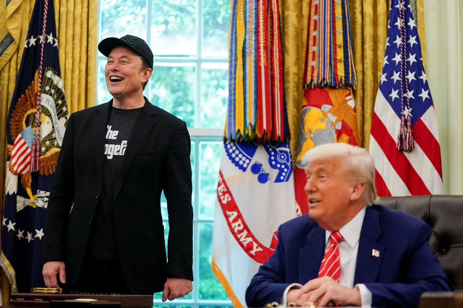 Immagine di Trump avverte Tesla: auto e componenti devono essere Made in USA