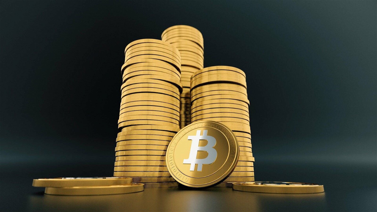 Immagine di Bitcoin: la moneta virtuale dei record tocca quota 66mila dollari