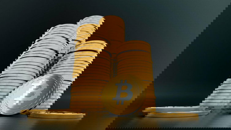 Immagine di Bitcoin: la moneta virtuale dei record tocca quota 66mila dollari